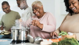 Happy African-American Family Following Healthy Holiday Food Safety Tips