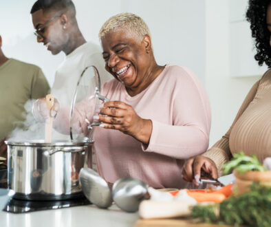 Happy African-American Family Following Healthy Holiday Food Safety Tips
