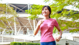 An Asian Woman Has a Safe Summer Workout Plan