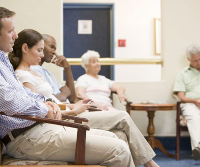 Five People Sitting in a Doctor’s Office Waiting Room Waiting to See the Doctor Why Do Doctors Take So Long